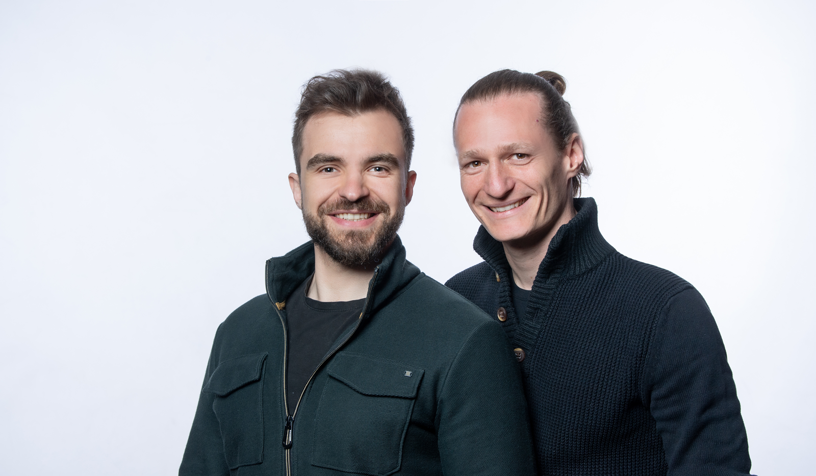 Max Kayr and Franz Baur of ZenoDev in front of a light background